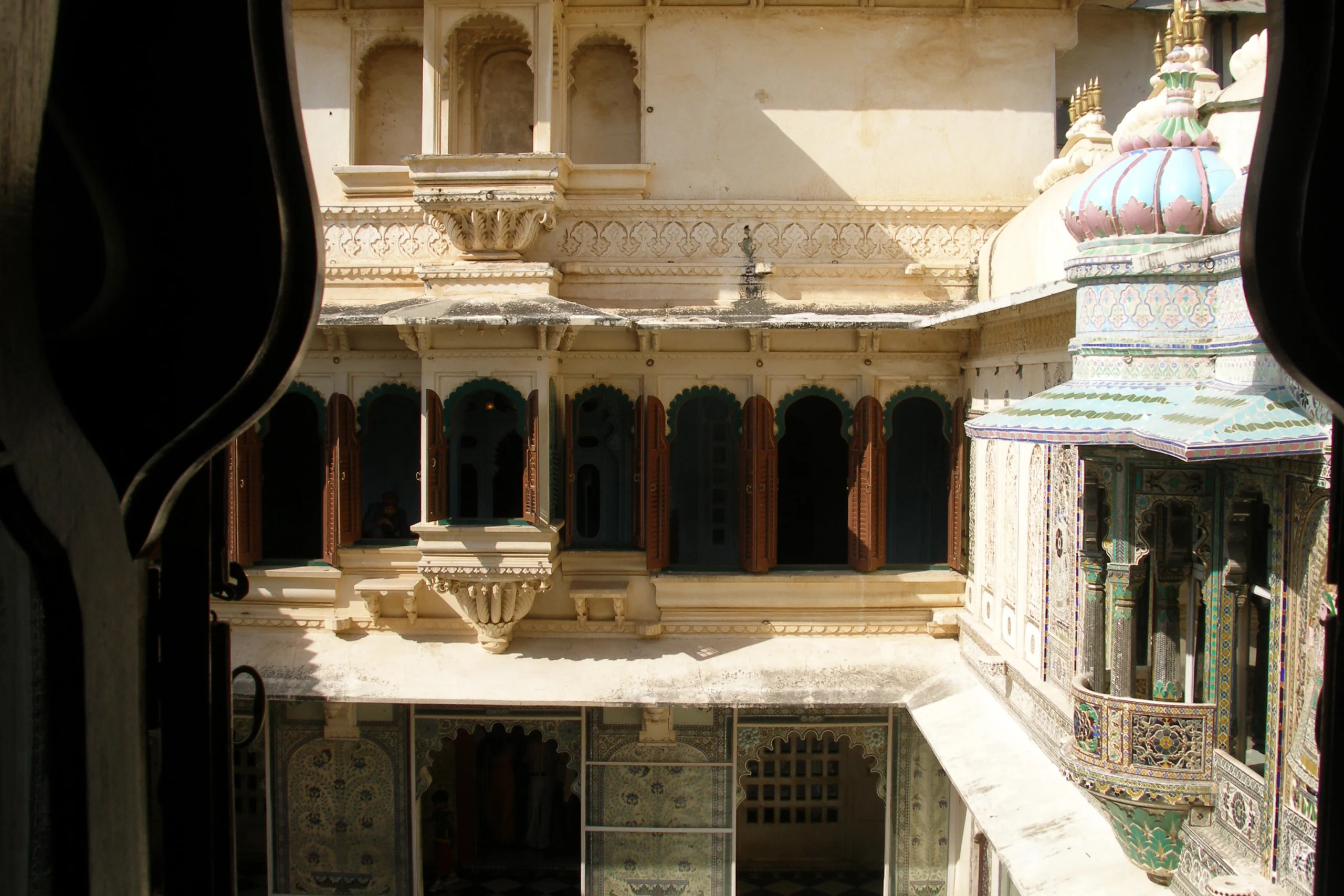 Intricate jharokhas and balconies on City Palace Udaipur