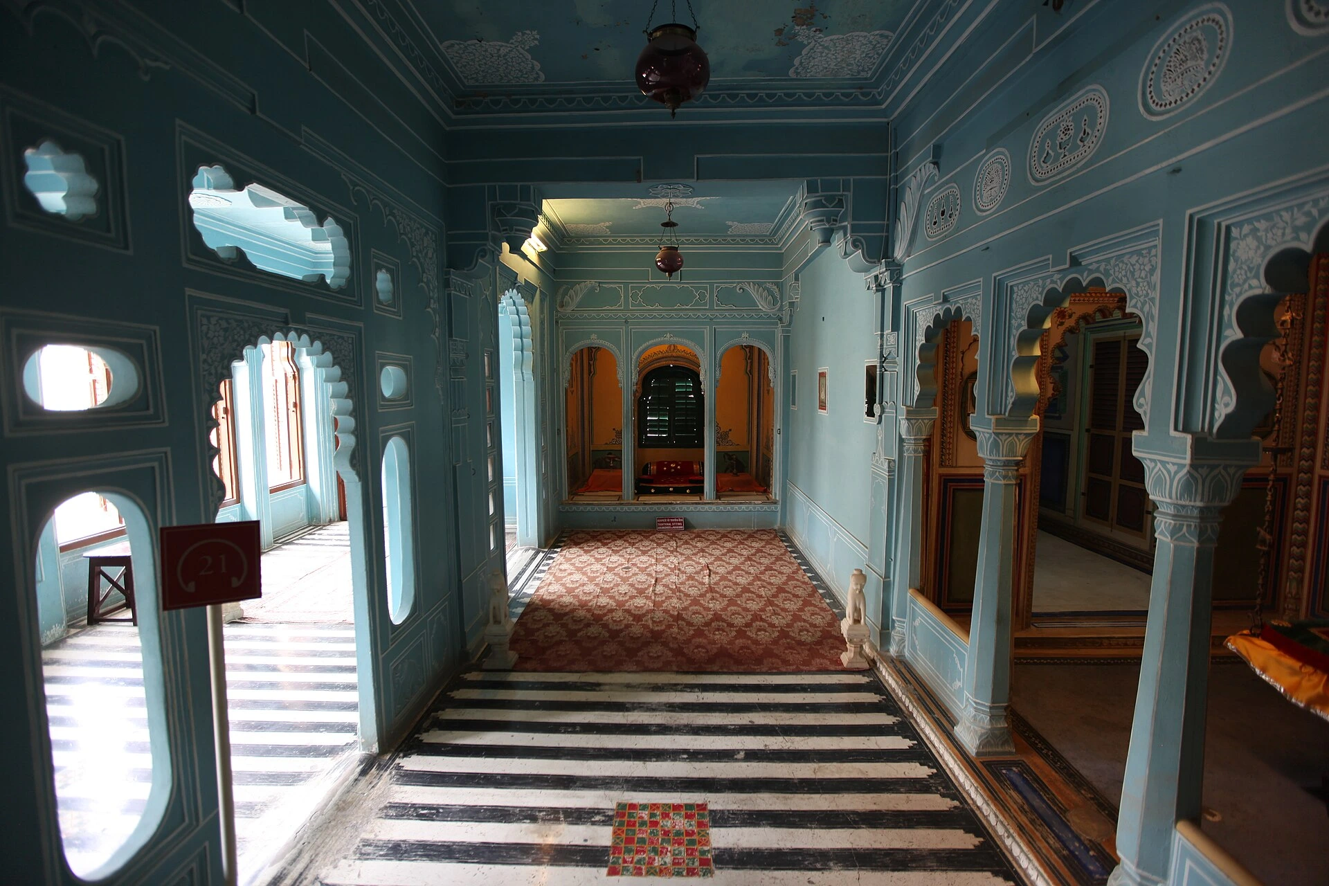 Interior architecture of City Palace Udaipur with arches and decorative details